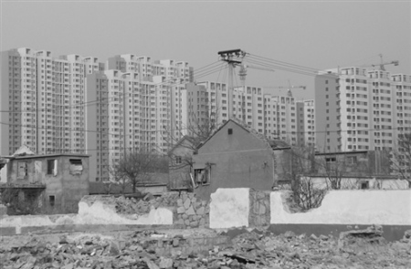 城鎮化成地方兩會熱議話題農民住樓更需融入城市